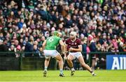 26 February 2023; Jason Flynn of Galway in action against Dan Morrissey of Limerick during the Allianz Hurling League Division 1 Group A match between Galway and Limerick at Pearse Stadium in Galway. Photo by Seb Daly/Sportsfile