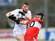26 February 2023; Neil Flynn of Kildare in action against Niall Toher of Derry during the Allianz Football League Division 2 match between Kildare and Derry at St Conleth's Park in Newbridge, Kildare. Photo by Piaras Ó Mídheach/Sportsfile