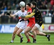 26 February 2023; Derry goalkeeper Odhrán Lynch and teammate Conor McCluskey in action against Jack Robinson of Kildare during the Allianz Football League Division 2 match between Kildare and Derry at St Conleth's Park in Newbridge, Kildare. Photo by Piaras Ó Mídheach/Sportsfile