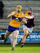 26 February 2023; David Fitzgerald of Clare is tackled by Shane Reck of Wexford during the Allianz Hurling League Division 1 Group A match between Wexford and Clare at Chadwicks Wexford Park in Wexford. Photo by Ray McManus/Sportsfile