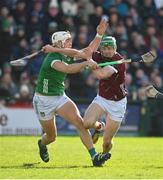 26 February 2023; Cianan Fahy of Galway is tackled by Kyle Hayes of Limerick during the Allianz Hurling League Division 1 Group A match between Galway and Limerick at Pearse Stadium in Galway. Photo by Seb Daly/Sportsfile