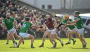 26 February 2023; Kevin Cooney of Galway in action against Darragh O’Donovan of Limerick, 8, during the Allianz Hurling League Division 1 Group A match between Galway and Limerick at Pearse Stadium in Galway. Photo by Seb Daly/Sportsfile