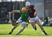 26 February 2023; Martin McManus of Galway in action against Richie English of Limerick during the Allianz Hurling League Division 1 Group A match between Galway and Limerick at Pearse Stadium in Galway. Photo by Seb Daly/Sportsfile