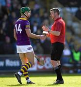 26 February 2023; Referee Thomas Walsh cautions Conor McDonald of Wexford before issuing him a yellow card during the Allianz Hurling League Division 1 Group A match between Wexford and Clare at Chadwicks Wexford Park in Wexford. Photo by Ray McManus/Sportsfile