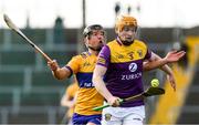 26 February 2023; Simon Donohoe of Wexford is tackled by David Reidy of Clare during the Allianz Hurling League Division 1 Group A match between Wexford and Clare at Chadwicks Wexford Park in Wexford. Photo by Ray McManus/Sportsfile