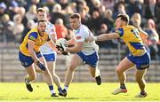 26 February 2023; Conor McCarthy of Monaghan in action against Diarmuid Murtagh of Roscommon during the Allianz Football League Division 1 match between Monaghan and Roscommon at St Tiernach's Park in Clones, Monaghan. Photo by Ramsey Cardy/Sportsfile