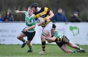 26 February 2023; Tom Treacy of Newbridge RFC is tackled by David O'Sullivan of Naas RFC during the Bank of Ireland Leinster Rugby Provincial Towns Cup Second Round match between Naas RFC and Newbridge RFC at Naas RFC in Naas, Kildare. Photo by Tyler Miller/Sportsfile