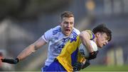 26 February 2023; Ben O'Carroll of Roscommon in action against Kieran Duffy of Monaghan during the Allianz Football League Division 1 match between Monaghan and Roscommon at St Tiernach's Park in Clones, Monaghan. Photo by Philip Fitzpatrick/Sportsfile