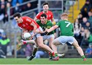 26 February 2023; Tommy Durnin of Louth in action against Niall Sharkey and Anthony Williams of Louth during the Allianz Football League Division 2 match between Meath and Louth at Páirc Tailteann in Navan, Meath. Photo by Stephen Marken/Sportsfile