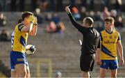26 February 2023; Niall Daly of Roscommon is shown a yellow card by Referee Niall Cullen during the Allianz Football League Division 1 match between Monaghan and Roscommon at St Tiernach's Park in Clones, Monaghan. Photo by Ramsey Cardy/Sportsfile