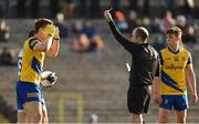 26 February 2023; Niall Daly of Roscommon is shown a yellow card by Referee Niall Cullen during the Allianz Football League Division 1 match between Monaghan and Roscommon at St Tiernach's Park in Clones, Monaghan. Photo by Ramsey Cardy/Sportsfile