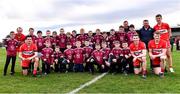 26 February 2023; Derry footballers Padraig Cassidy, 7, Chrissy McKaigue, 2, Paul McNeill, 17, Brendan Rogers, 9, and Shane McGuigan, 14, with members of their club Slaughtneil after the Allianz Football League Division 2 match between Kildare and Derry at St Conleth's Park in Newbridge, Kildare. Photo by Piaras Ó Mídheach/Sportsfile