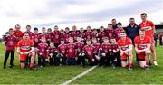 26 February 2023; Derry footballers Padraig Cassidy, 7, Chrissy McKaigue, 2, Paul McNeill, 17, Brendan Rogers, 9, and Shane McGuigan, 14, with members of their club Slaughtneil after the Allianz Football League Division 2 match between Kildare and Derry at St Conleth's Park in Newbridge, Kildare. Photo by Piaras Ó Mídheach/Sportsfile