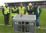26 February 2023; Stewards, from left, Ger Finnigan, Peter Mulryan, Tom Concannon, Tom Flaherty and Jimmy Acton watch a monitor, showing the Allianz Football League Division 1 match between Donegal and Galway, before the Allianz Hurling League Division 1 Group A match between Galway and Limerick at Pearse Stadium in Galway. Photo by Seb Daly/Sportsfile