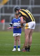 26 February 2023; Conor Delaney of Kilkenny signs the hurl of Finn Byrne, aged 10, from Portlaoise, Co Laois, after the Allianz Hurling League Division 1 Group B match between Laois and Kilkenny at Laois Hire O'Moore Park in Portlaoise, Laois. Photo by Daire Brennan/Sportsfile