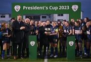 25 February 2023; Athlone Town captain Laurie Ryan is presented with the cup by President of Ireland Michael D Higgins after the FAI Women's President's Cup match between Athlone Town and Shelbourne at Athlone Town Stadium in Athlone, Westmeath. Photo by Stephen McCarthy/Sportsfile