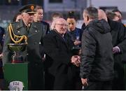 25 February 2023; Athlone Town manager Tommy Hewitt is presented with his winners medal by President of Ireland Michael D Higgins after the FAI Women's President's Cup match between Athlone Town and Shelbourne at Athlone Town Stadium in Athlone, Westmeath. Photo by Stephen McCarthy/Sportsfile