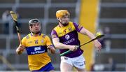 26 February 2023; Simon Donohoe of Wexford is tackled by David Reidy of Clare during the Allianz Hurling League Division 1 Group A match between Wexford and Clare at Chadwicks Wexford Park in Wexford. Photo by Ray McManus/Sportsfile