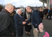 25 February 2023; President of Ireland Michael D Higgins meets Mayor of the Athlone-Moate Municipal District, Vinny McCormack, right, in the company of FAI President Gerry McAnaney, left, during the FAI Women's President's Cup match between Athlone Town and Shelbourne at Athlone Town Stadium in Athlone, Westmeath. Photo by Stephen McCarthy/Sportsfile