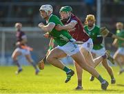 26 February 2023; Kyle Hayes of Limerick in action against Cianan Fahy of Galway during the Allianz Hurling League Division 1 Group A match between Galway and Limerick at Pearse Stadium in Galway. Photo by Seb Daly/Sportsfile