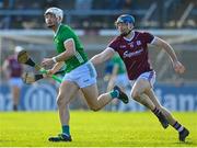 26 February 2023; Kyle Hayes of Limerick in action against Conor Cooney of Galway during the Allianz Hurling League Division 1 Group A match between Galway and Limerick at Pearse Stadium in Galway. Photo by Seb Daly/Sportsfile