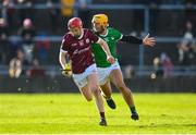 26 February 2023; Tom Monaghan of Galway in action against Tom Morrissey of Limerick during the Allianz Hurling League Division 1 Group A match between Galway and Limerick at Pearse Stadium in Galway. Photo by Seb Daly/Sportsfile