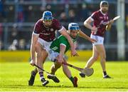 26 February 2023; Conor Cooney of Galway in action against Ciaran Barry of Limerick during the Allianz Hurling League Division 1 Group A match between Galway and Limerick at Pearse Stadium in Galway. Photo by Seb Daly/Sportsfile