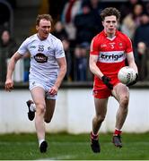 26 February 2023; Eoin McEvoy of Derry gets away from Paul Cribbin of Kildare during the Allianz Football League Division 2 match between Kildare and Derry at St Conleth's Park in Newbridge, Kildare. Photo by Piaras Ó Mídheach/Sportsfile