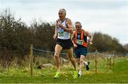 12 February 2023; Joe Gough of West Waterford AC, Waterford, left, competing in the Master Men 65+ 4000m during the 123.ie National Intermediate, Masters & Juvenile B Cross Country Championships at Gowran Demense in Kilkenny. Photo by Sam Barnes/Sportsfile