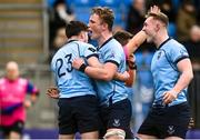 27 February 2023; Charles Foley of St Michaels College, left, celebrates with team mate James White after scoring their side's fifth try during the Bank of Ireland Leinster Rugby Schools Senior Cup Quarter Final match between Clongowes Wood College and St Michael’s College at Energia Park in Dublin. Photo by David Fitzgerald/Sportsfile