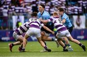 27 February 2023; Mark Canniffe of St Michaels College is tackled by Gavin Keane, left, and Tom Murtagh of Clongowes Wood College during the Bank of Ireland Leinster Rugby Schools Senior Cup Quarter Final match between Clongowes Wood College and St Michael’s College at Energia Park in Dublin. Photo by David Fitzgerald/Sportsfile