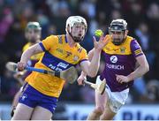 26 February 2023; Brandon O'Connell of Clare in action against Connal Flood of Wexford during the Allianz Hurling League Division 1 Group A match between Wexford and Clare at Chadwicks Wexford Park in Wexford. Photo by Ray McManus/Sportsfile
