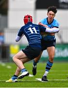 28 February 2023; Sean King of St Michael's College is tackled by Jaydon Carroll of Castleknock College during the Bank of Ireland Leinster Schools Junior Cup Quarter Final match between Castleknock College and St Michael’s College at Energia Park in Dublin. Photo by Ben McShane/Sportsfile