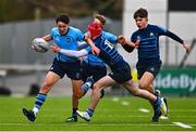 28 February 2023; Sean King of St Michael's College is tackled by Jaydon Carroll of Castleknock College during the Bank of Ireland Leinster Schools Junior Cup Quarter Final match between Castleknock College and St Michael’s College at Energia Park in Dublin. Photo by Ben McShane/Sportsfile