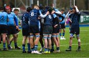 28 February 2023; Castleknock College players huddle before taking part in a scrum during the Bank of Ireland Leinster Schools Junior Cup Quarter Final match between Castleknock College and St Michael’s College at Energia Park in Dublin. Photo by Giselle O'Donoghue/Sportsfile