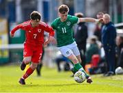1 March 2023; Brody Lee of Republic of Ireland in action against Kai Rhodes of Wales during the U15 international friendly match between Republic of Ireland and Wales at the Carlisle Grounds in Bray. Photo by Piaras Ó Mídheach/Sportsfile