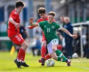 1 March 2023; Brody Lee of Republic of Ireland in action against Rohan Hillier, left, and Kai Rhodes of Wales during the U15 international friendly match between Republic of Ireland and Wales at the Carlisle Grounds in Bray. Photo by Piaras Ó Mídheach/Sportsfile
