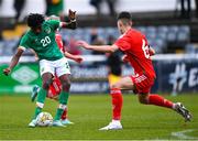 1 March 2023; Jaden Umeh of Republic of Ireland shoots to score his side's third goal, under pressure from Luis Gardner of Wales, 6, during the U15 international friendly match between Republic of Ireland and Wales at the Carlisle Grounds in Bray. Photo by Piaras Ó Mídheach/Sportsfile