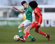 1 March 2023; Max Kovalevskis of Republic of Ireland in action against Jayden Leinou of Wales during the U15 international friendly match between Republic of Ireland and Wales at the Carlisle Grounds in Bray. Photo by Piaras Ó Mídheach/Sportsfile
