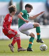 1 March 2023; Ramon Martos of Republic of Ireland in action against Hayden Allmark of Wales during the U15 international friendly match between Republic of Ireland and Wales at the Carlisle Grounds in Bray. Photo by Piaras Ó Mídheach/Sportsfile