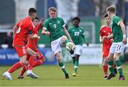 1 March 2023; Michael Noonan of Republic of Ireland in action against Luis Gardner, left, and Harrison Pugh of Wales during the U15 international friendly match between Republic of Ireland and Wales at the Carlisle Grounds in Bray. Photo by Piaras Ó Mídheach/Sportsfile