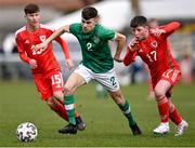 1 March 2023; Max Kovalevskis of Republic of Ireland in action against Callum Jones of Wales, right, during the U15 international friendly match between Republic of Ireland and Wales at the Carlisle Grounds in Bray. Photo by Piaras Ó Mídheach/Sportsfile