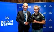 1 March 2023; Dannah O'Brien is presented with her first cap by incoming Leinster Rugby president Billy Murphy during the Leinster Rugby Women's Cap and Jersey presentation at the Bank of Ireland Montrose Branch in Dublin. Photo by Harry Murphy/Sportsfile