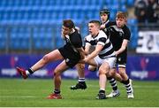 2 March 2023; Ronan Sullivan of Cistercian College Roscrea is tackled by Paul Dunne of Belvedere College during the Bank of Ireland Leinster Schools Junior Cup Quarter Final match between Cistercian College Roscrea and Belvedere College at Energia Park in Dublin. Photo by Ben McShane/Sportsfile