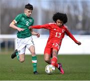 1 March 2023; Jayden Lienou of Wales in action against Max Kovalevskis of Republic of Ireland during the U15 international friendly match between Republic of Ireland and Wales at the Carlisle Grounds in Bray. Photo by Piaras Ó Mídheach/Sportsfile