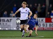 3 March 2023; Greg Sloggett of Dundalk in action against Vladislav Kreida of St Patrick's Athletic during the SSE Airtricity Men's Premier Division match between Dundalk and St Patrick's Athletic at Oriel Park in Dundalk, Louth. Photo by Ben McShane/Sportsfile