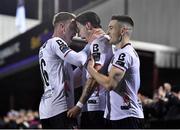 3 March 2023; Louis Annesley of Dundalk celebrates with teammate Hayden Muller, left, and Darragh Leahy, right, after scoring their side's second goal during the SSE Airtricity Men's Premier Division match between Dundalk and St Patrick's Athletic at Oriel Park in Dundalk, Louth. Photo by Ben McShane/Sportsfile