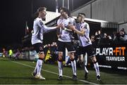 3 March 2023; Louis Annesley of Dundalk celebrates with teammate Hayden Muller, left, and Darragh Leahy, right, after scoring their side's second goal during the SSE Airtricity Men's Premier Division match between Dundalk and St Patrick's Athletic at Oriel Park in Dundalk, Louth. Photo by Ben McShane/Sportsfile