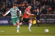 3 March 2023; Ben Doherty of Derry City on his way to scoring his side's first goal despite the attention of Dylan Watts of Shamrock Rovers during the SSE Airtricity Men's Premier Division match between Shamrock Rovers and Derry City at Tallaght Stadium in Dublin. Photo by Stephen McCarthy/Sportsfile