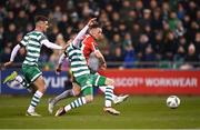 3 March 2023; Ben Doherty of Derry City shoots to score his side's first goal despite the attention of Trevor Clarke and Dylan Watts, left, of Shamrock Rovers during the SSE Airtricity Men's Premier Division match between Shamrock Rovers and Derry City at Tallaght Stadium in Dublin. Photo by Stephen McCarthy/Sportsfile